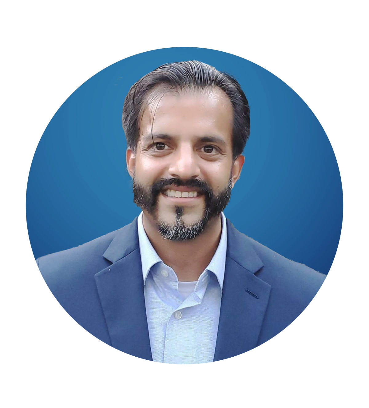 A man with a beard is wearing a blue suit and white shirt.