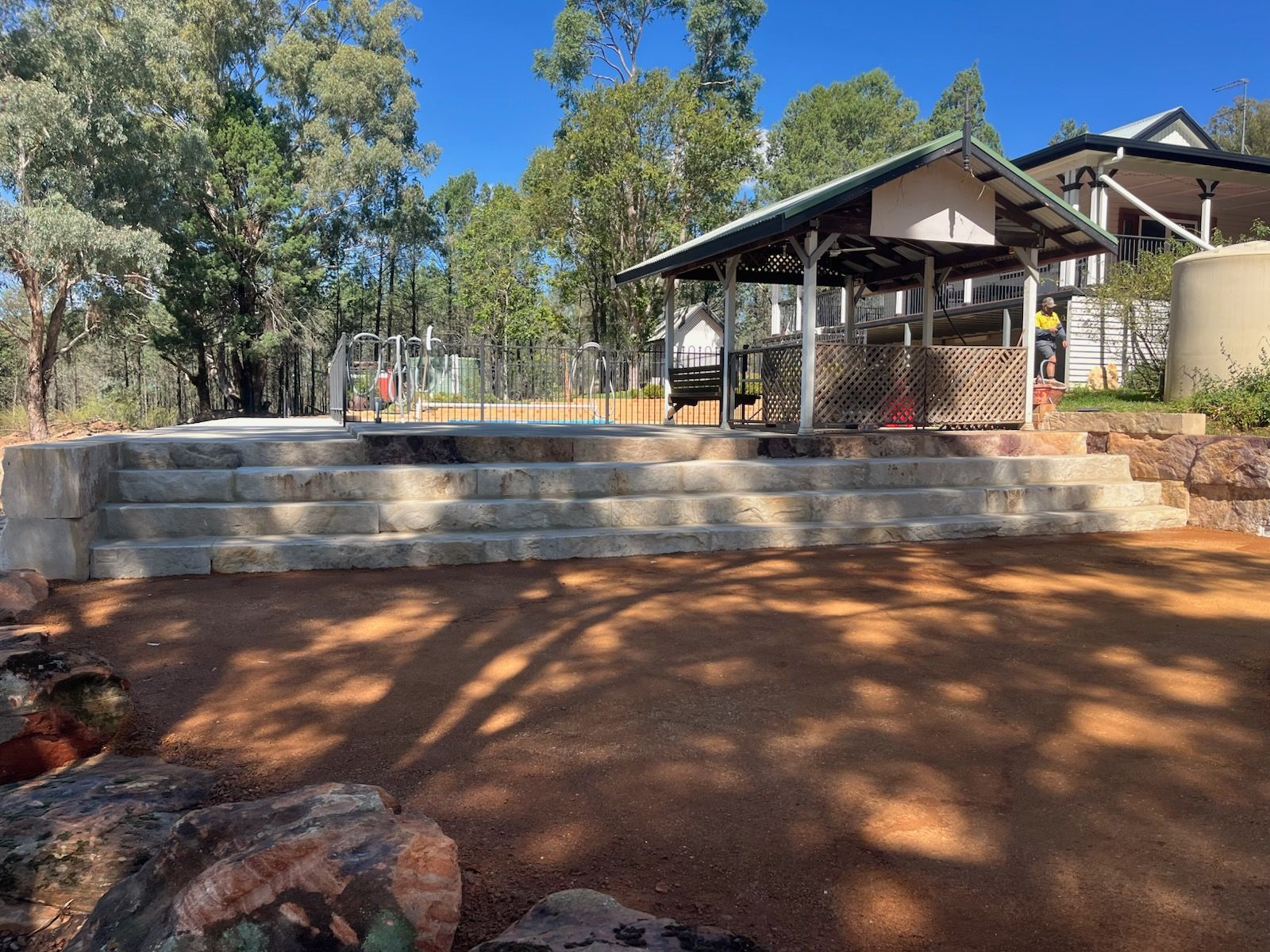 A covered pavilion and play area in a park with trees — Dubbo Premier Landscapes in Dubbo, NSW