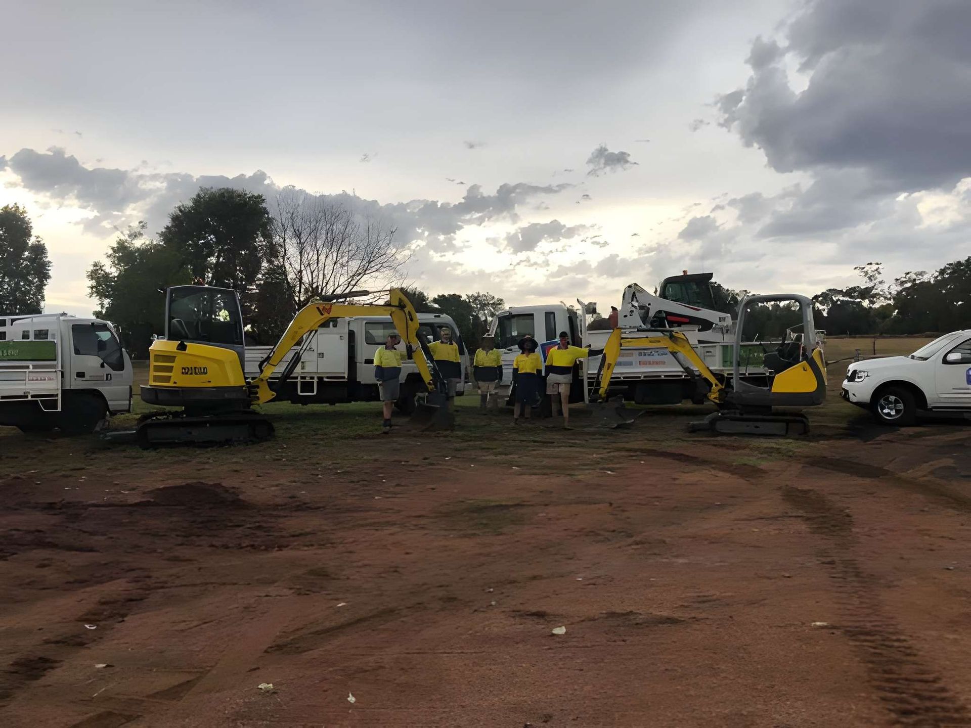 Construction Vehicles and Workers in a Field — Dubbo Premier Landscapes in Gilgandra, NSW