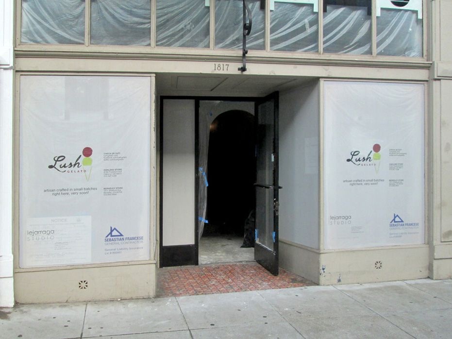 A building with a sign that says lush on it