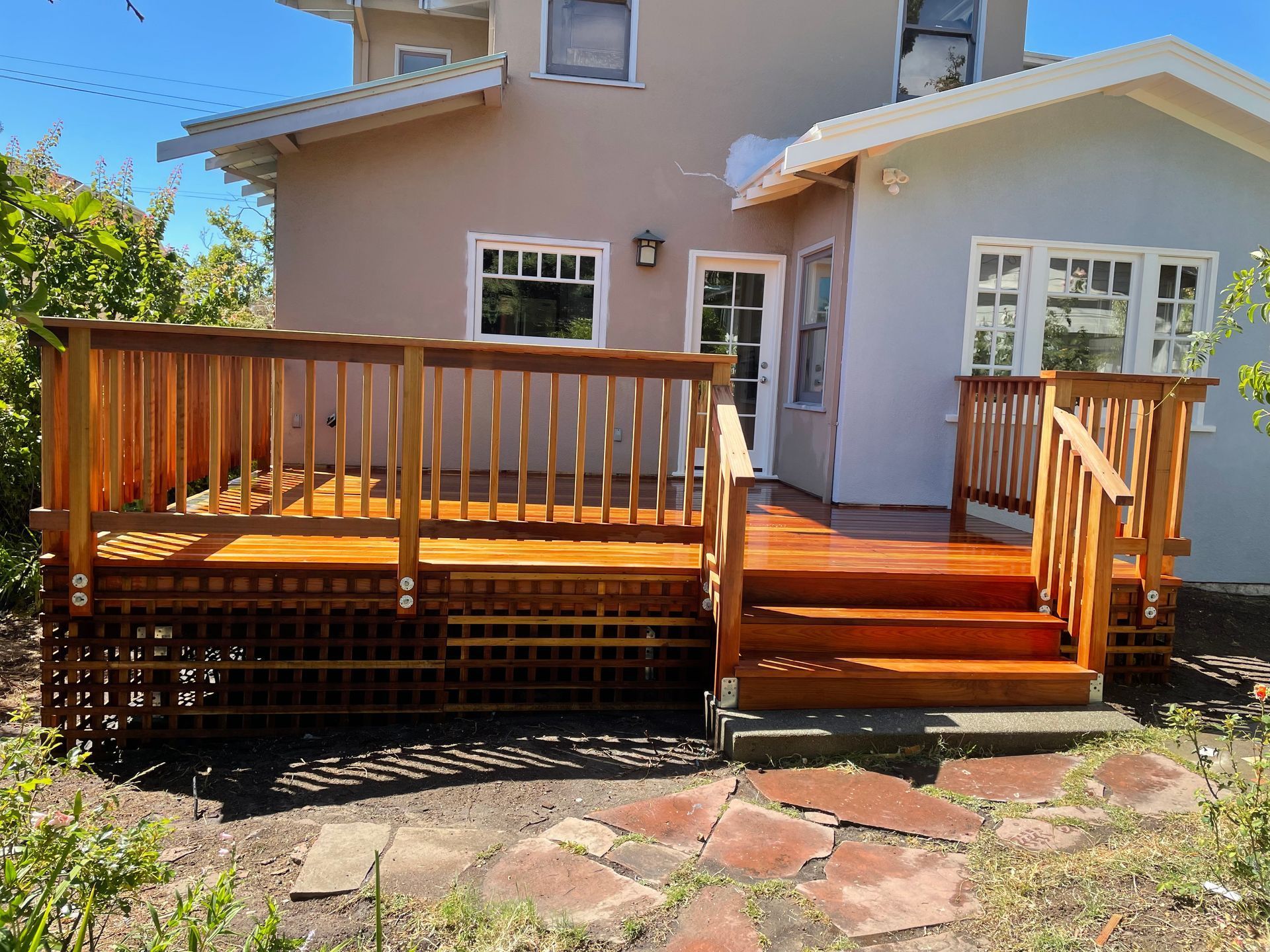 A patio is being built in front of a house
