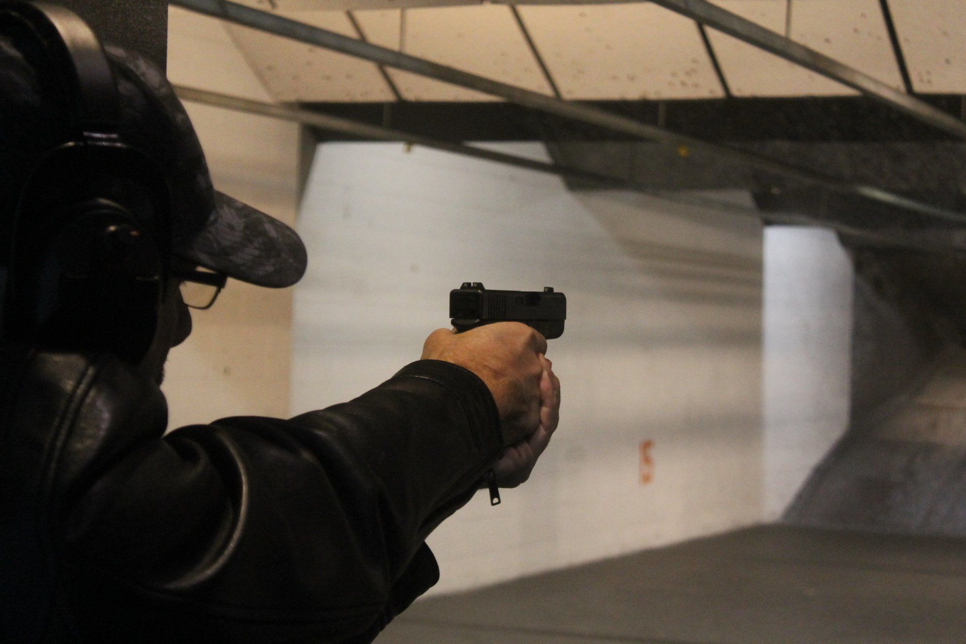Man with Glock at Shooting Range