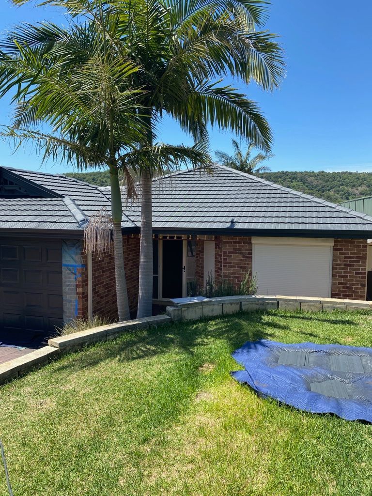  The Roof Of A Building — The Good Guys Roof Restorations In Woonona, NSW