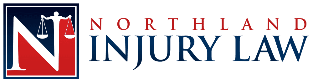 A logo for northland injury law with a scale of justice