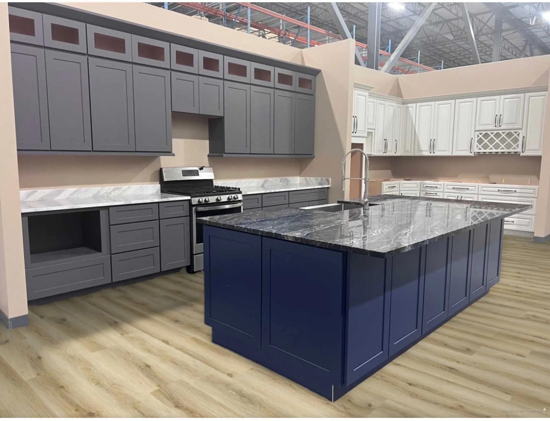A kitchen with gray cabinets and a blue island in the middle.