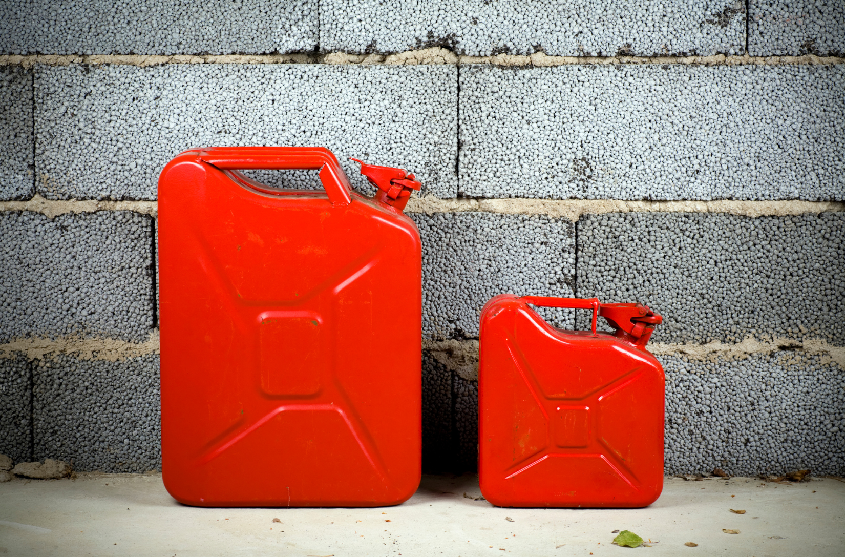 Picture of red jerry cans for gas delivery