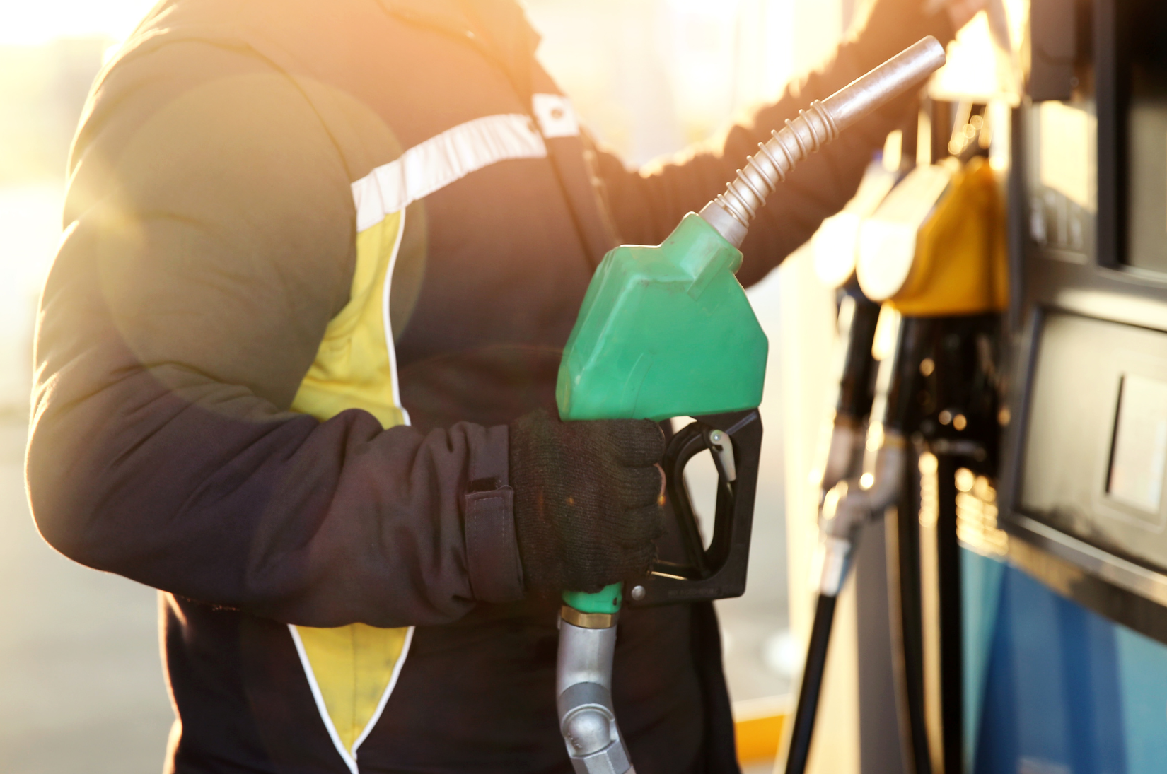 Fuel is being pumped into a gas tank