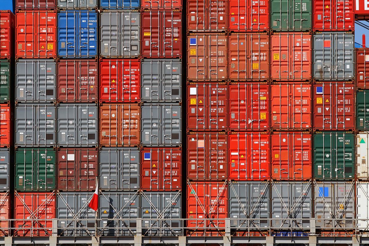 A row of shipping containers stacked on top of each other