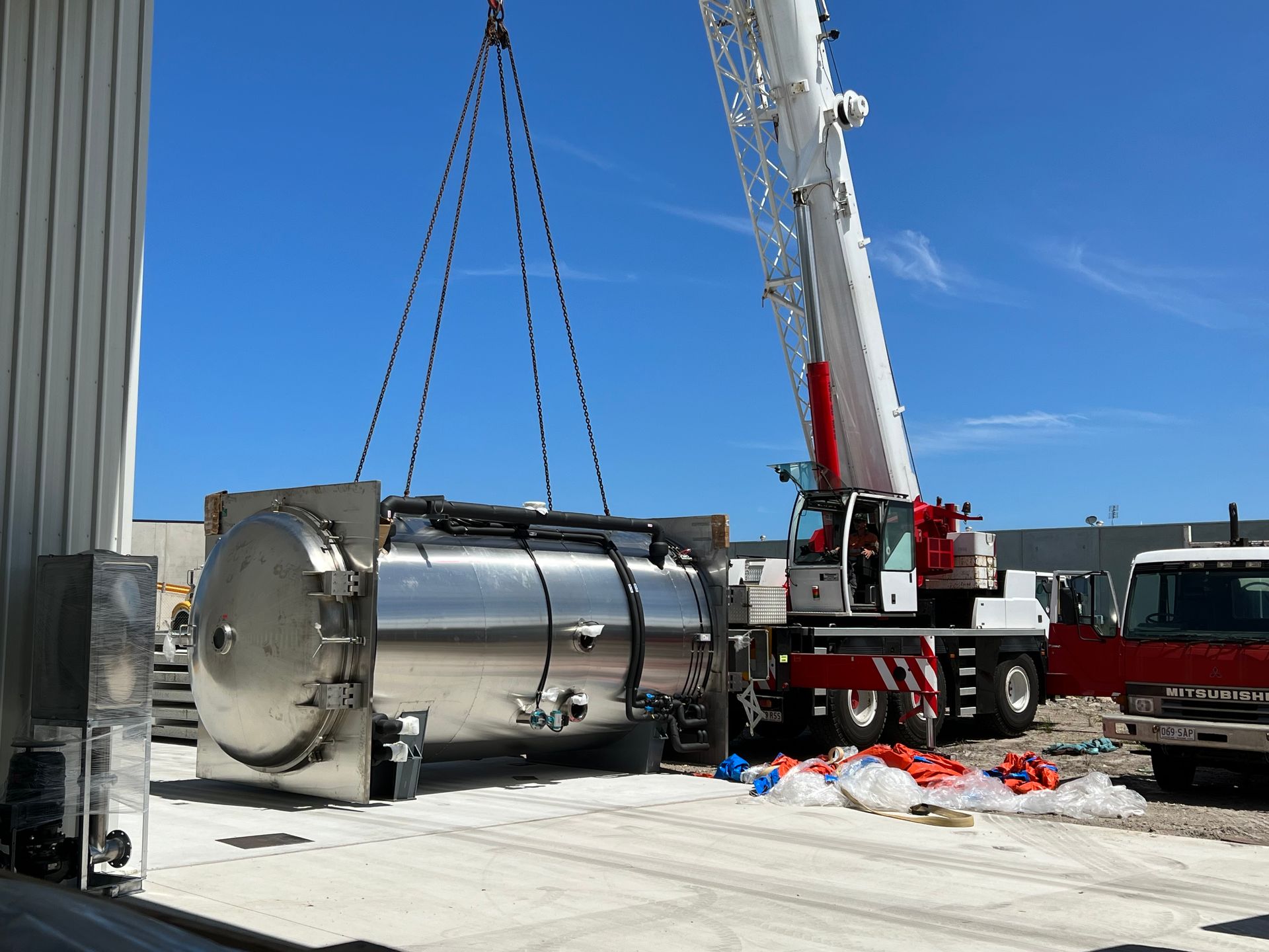 An Empty Freezer Room With White Walls and a Ceiling Fan — Chillzone Refrigeration and Air Conditioning in Maleny, QLD