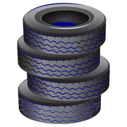 Four tires are stacked on top of each other on a white background