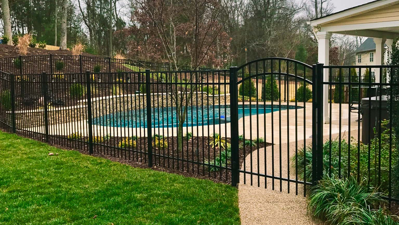 black iron fence with gate