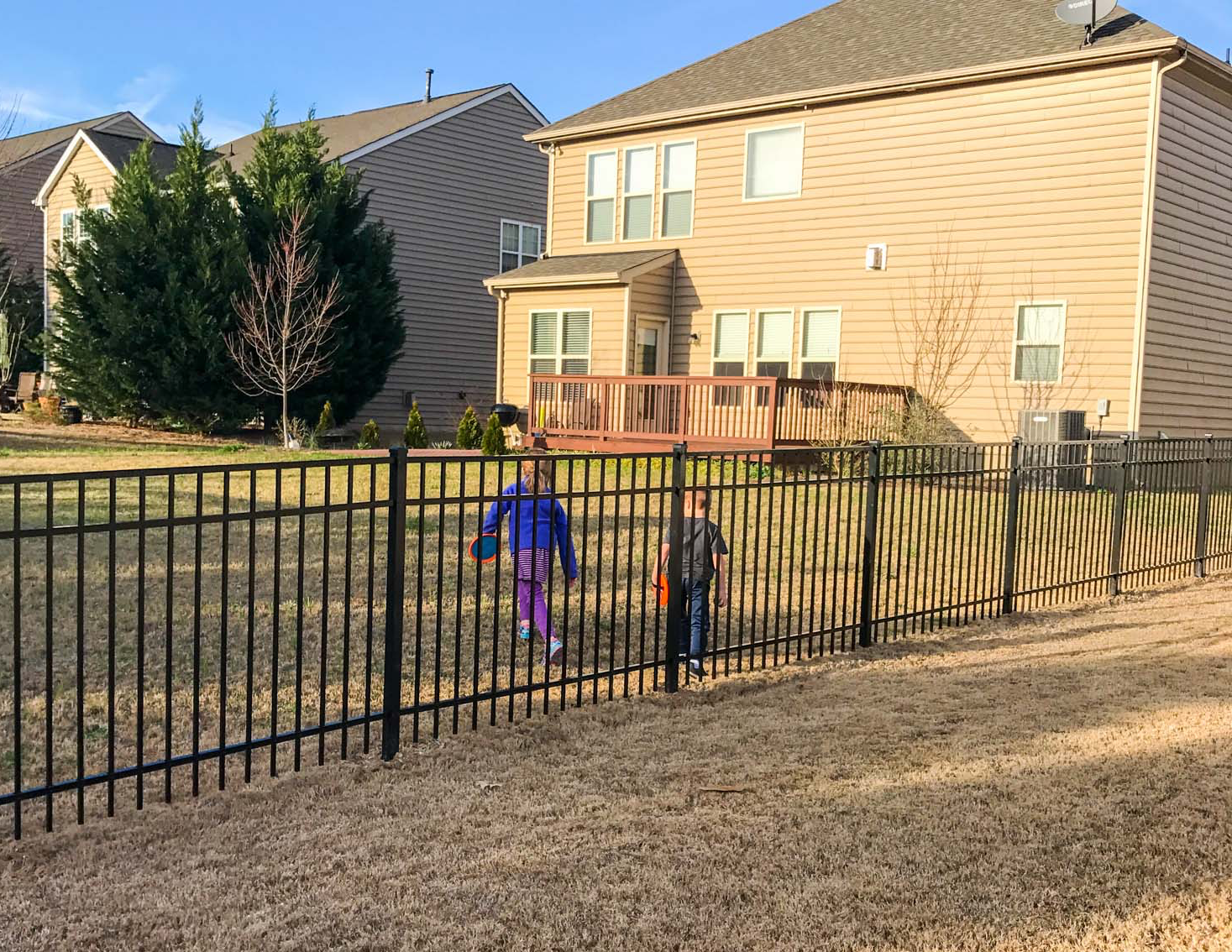Chain link fence installed around a commercial property.
