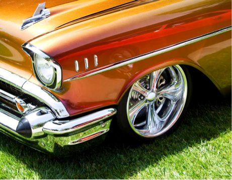 A close up of a car with the number 111 on the hood