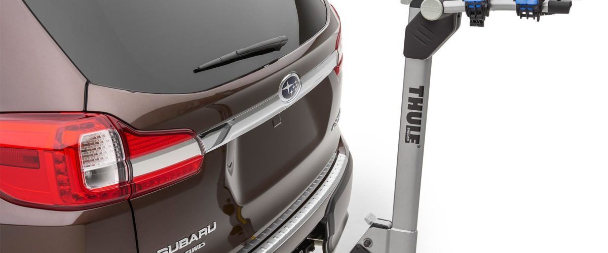 A car with a thule bike rack attached to it