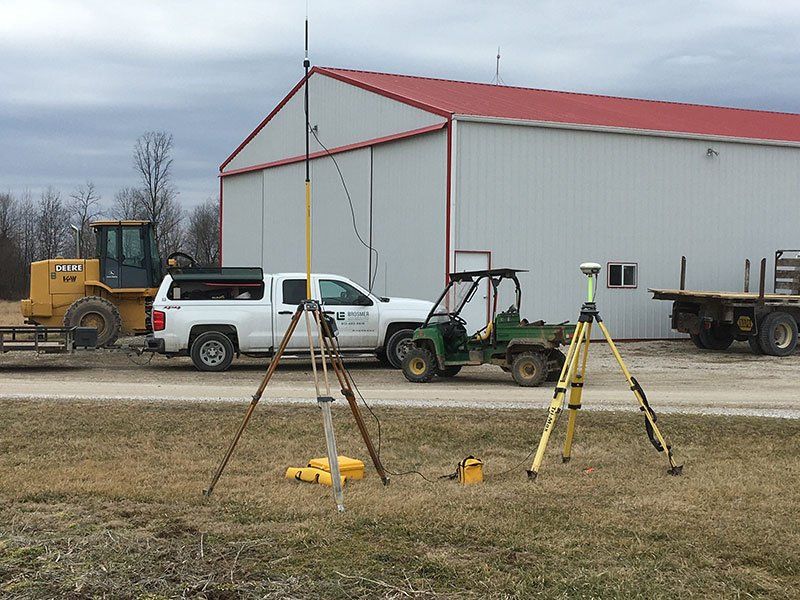 Surveyor Tripod at Construction Site — Jasper, IN — Brosmer Land Surveying & Engineering Inc.