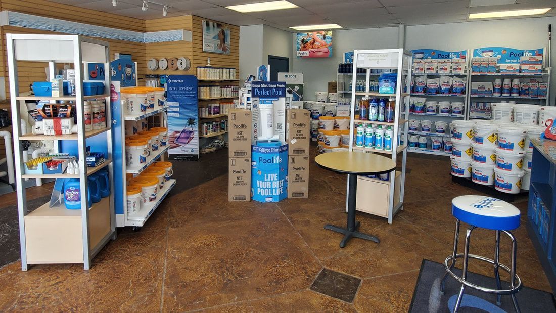 A store filled with lots of shelves and a table.