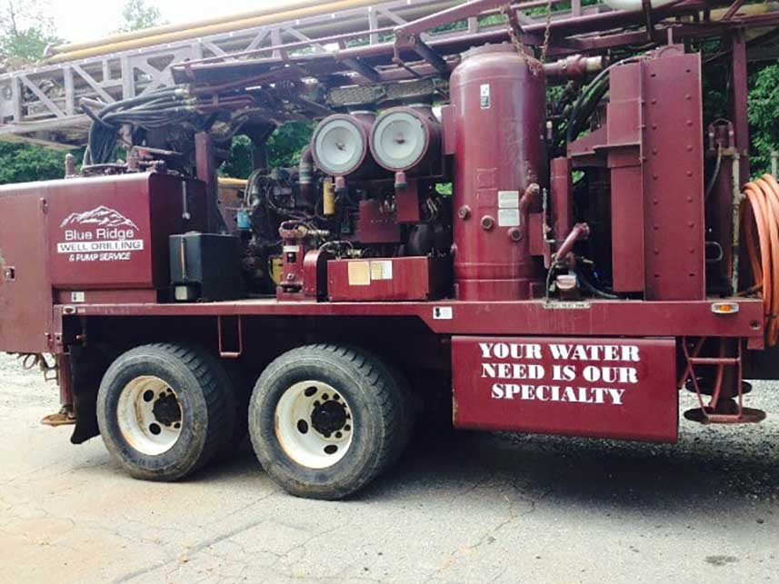Red truck — pump installation in Hot Springs, NC