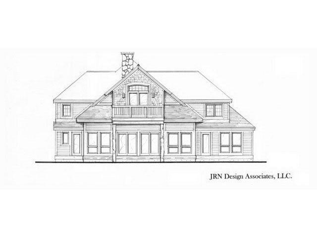 Architectural rendering of a house with multiple windows, a balcony, and a chimney.