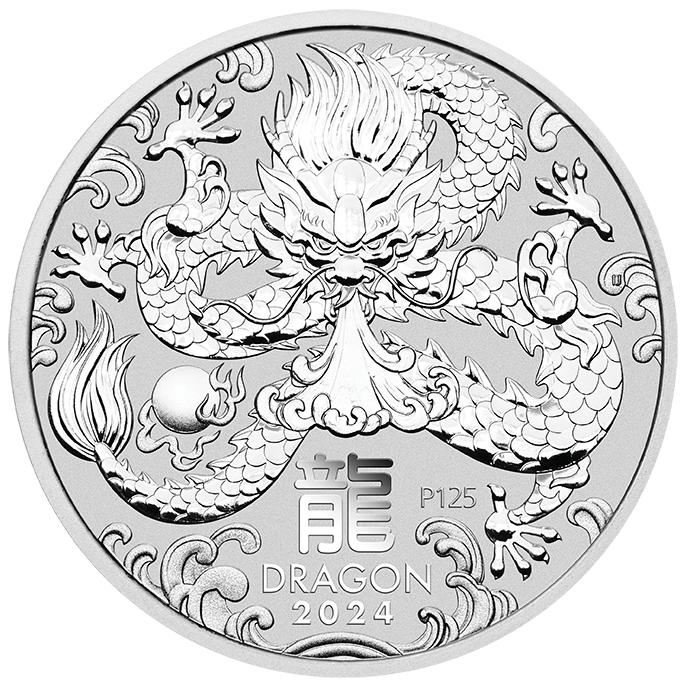 A silver coin with a dragon on it.
