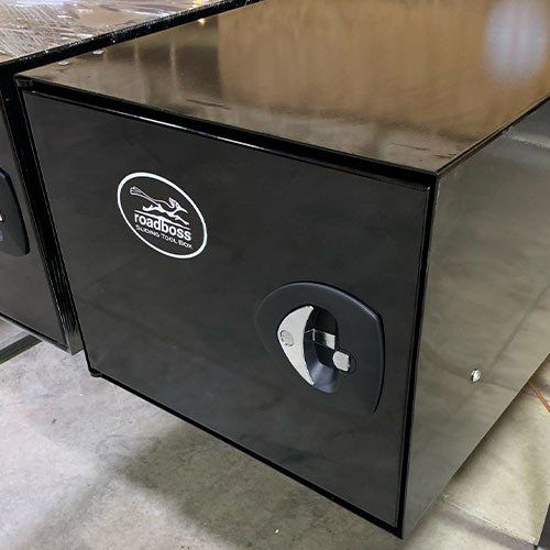 The Roadboss Toolbox Compression T-lock latches hold the door tight