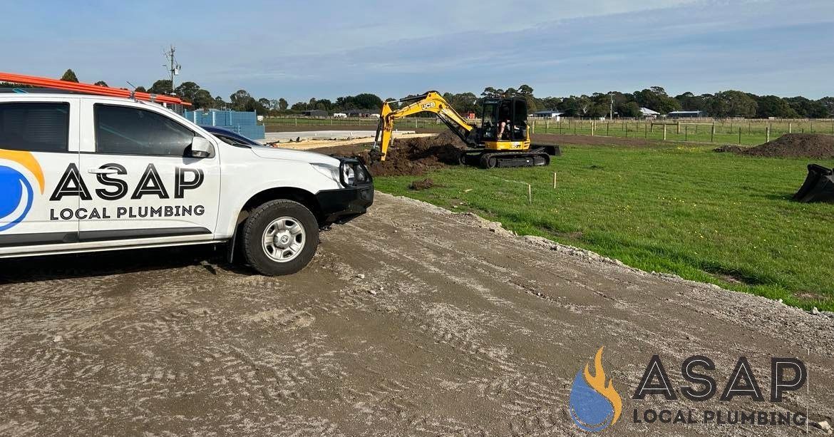 White Asap Pickup Truck Is Parked On The Side Of A Dirt Road Near Excavator — ASAP Local Plumbing in Warrnambool, VIC