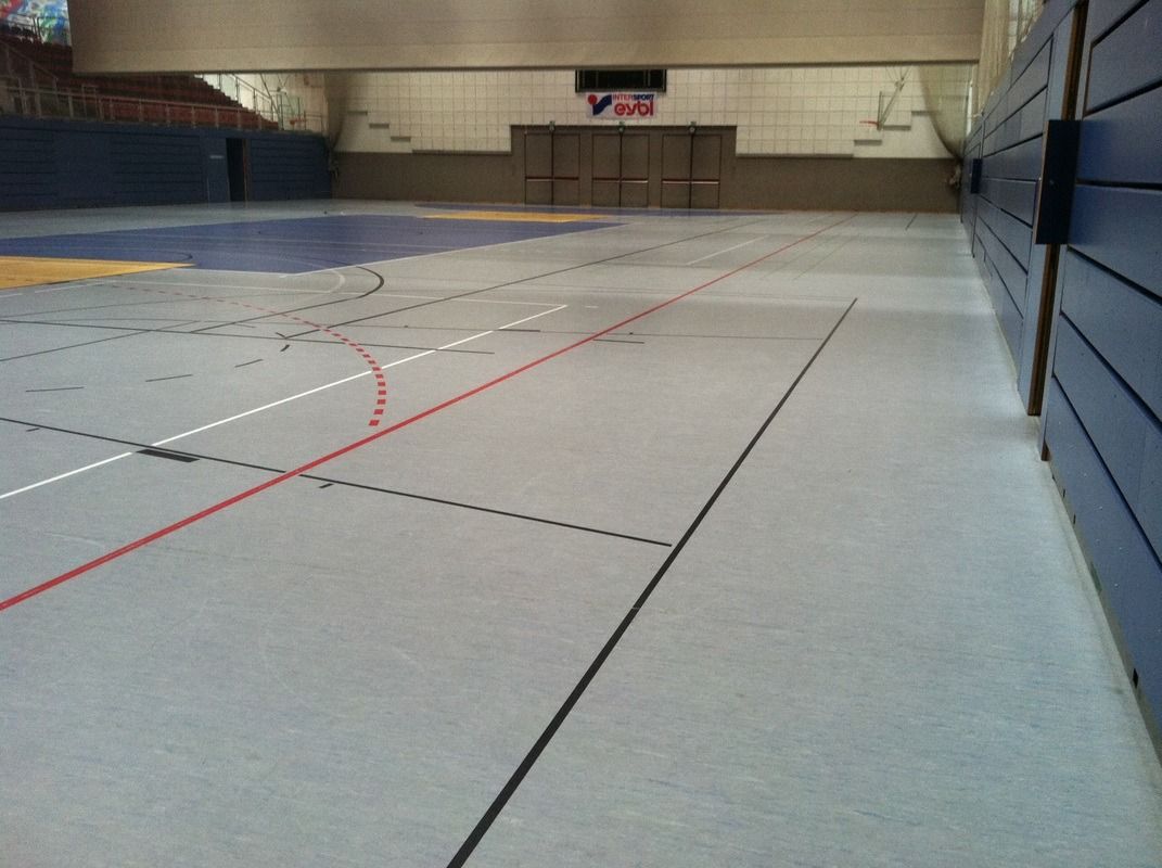 A large empty gym, on a Hart's Athletic installed floor.
