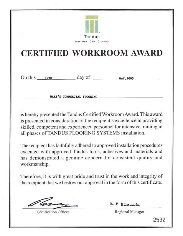 A certificate for a certified workroom award is on a white background.