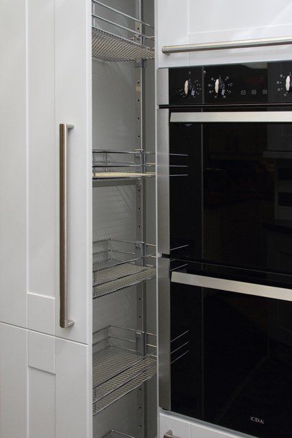 An example kitchen layout, with kitchen cupboards, worktops and appliances