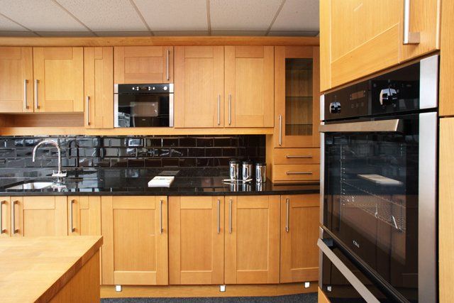 An example kitchen layout, with kitchen cupboards, worktops and appliances