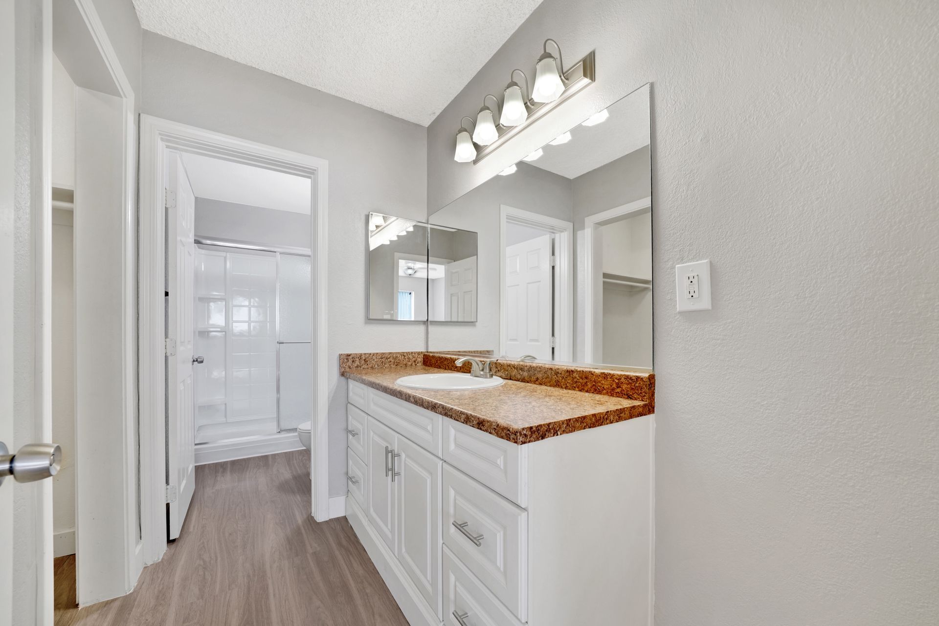 Photo of a bathroom with a shower/bathtub combination