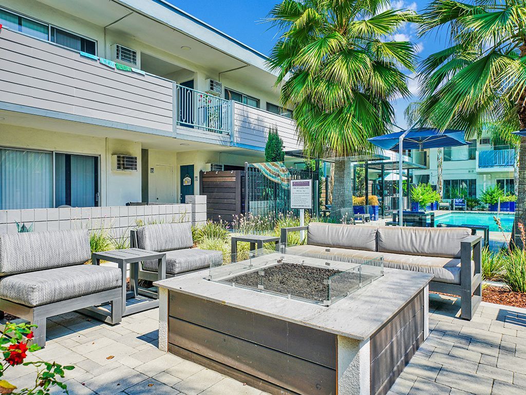 Photo of a firepit, with surrounding seating