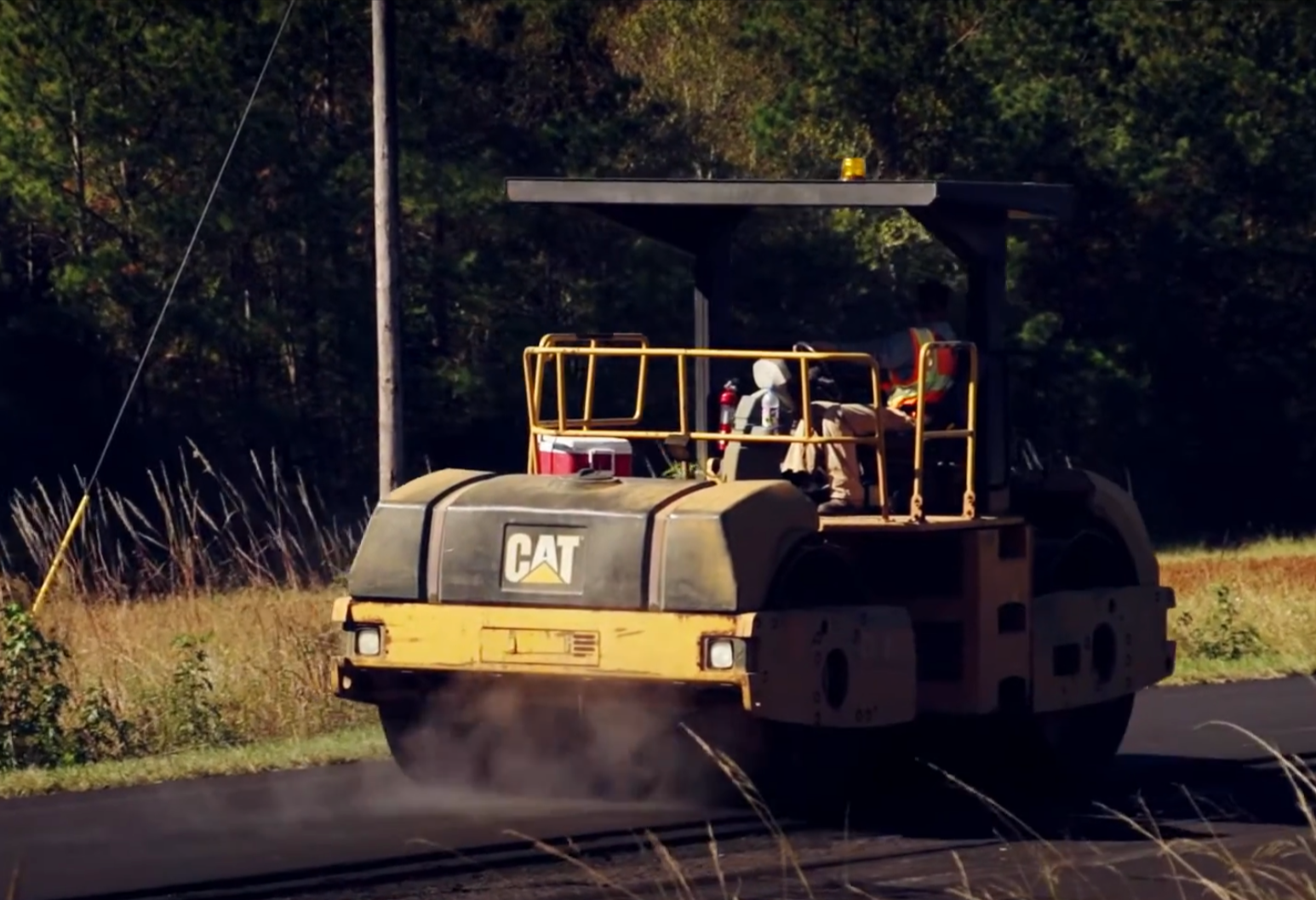 Crew rolling fresh asphalt