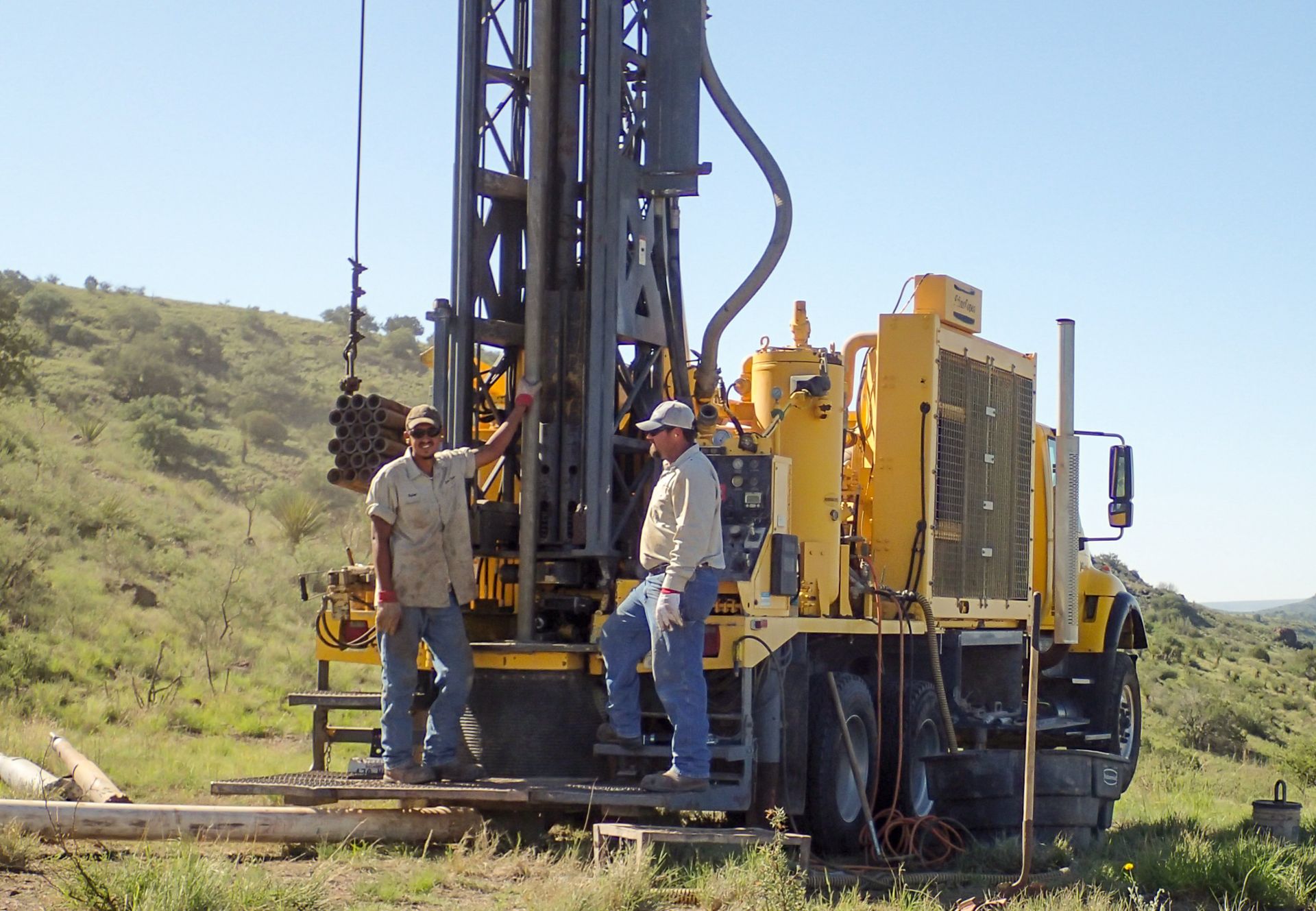skinner's well drillers standing with well drilling equipment - Brewster County, Presidio County, Jeff Davis County, Pecos County, Reeves County, Terrell County