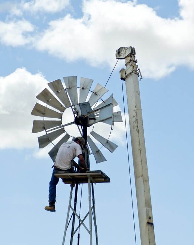 skinner's worker installing a windmill - Brewster County, Presidio County, Jeff Davis County, Pecos County, Reeves County, Terrell County