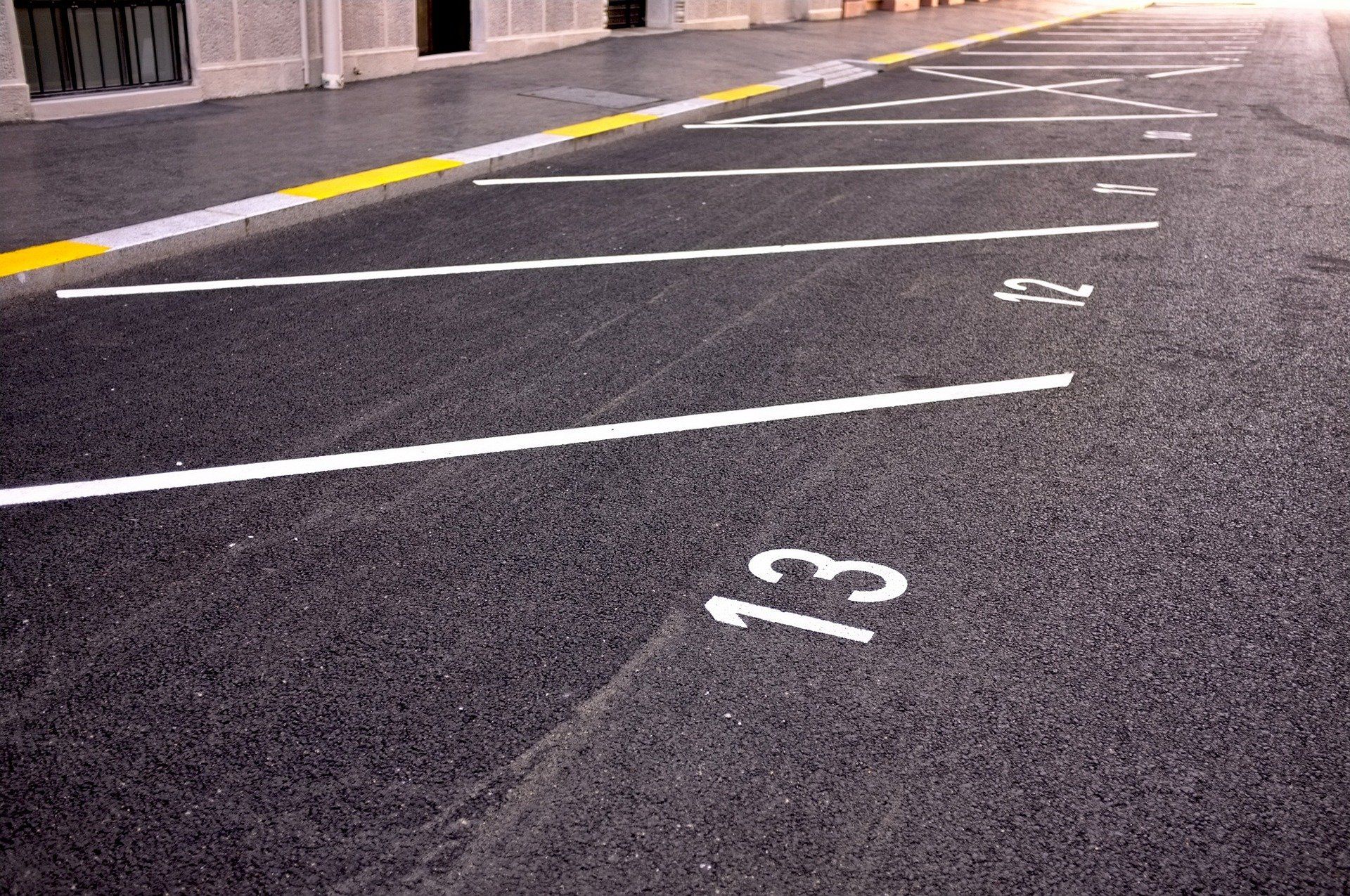 A parking lot with the number 13 painted on it