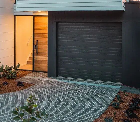 Paved Driveway leading to Panelift Garage Door — Schofield's Garage Doors in Robertson, NSW