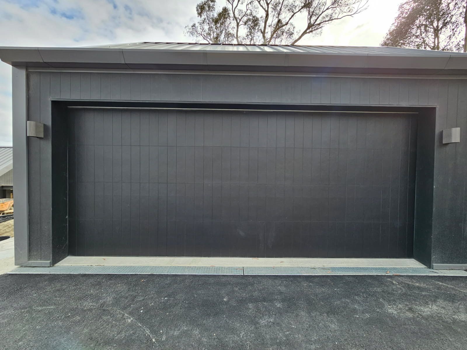 A Black Garage Door — Schofield's Garage Doors in Robertson, NSW