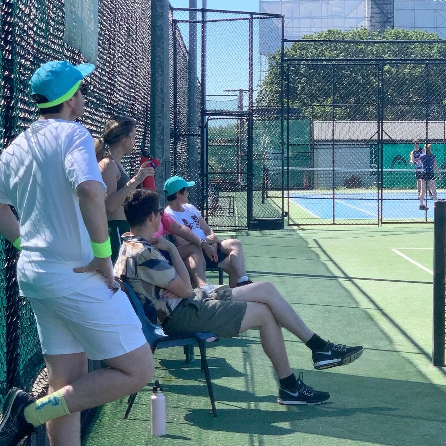 A woman is doing a yoga pose on a mat in a room.