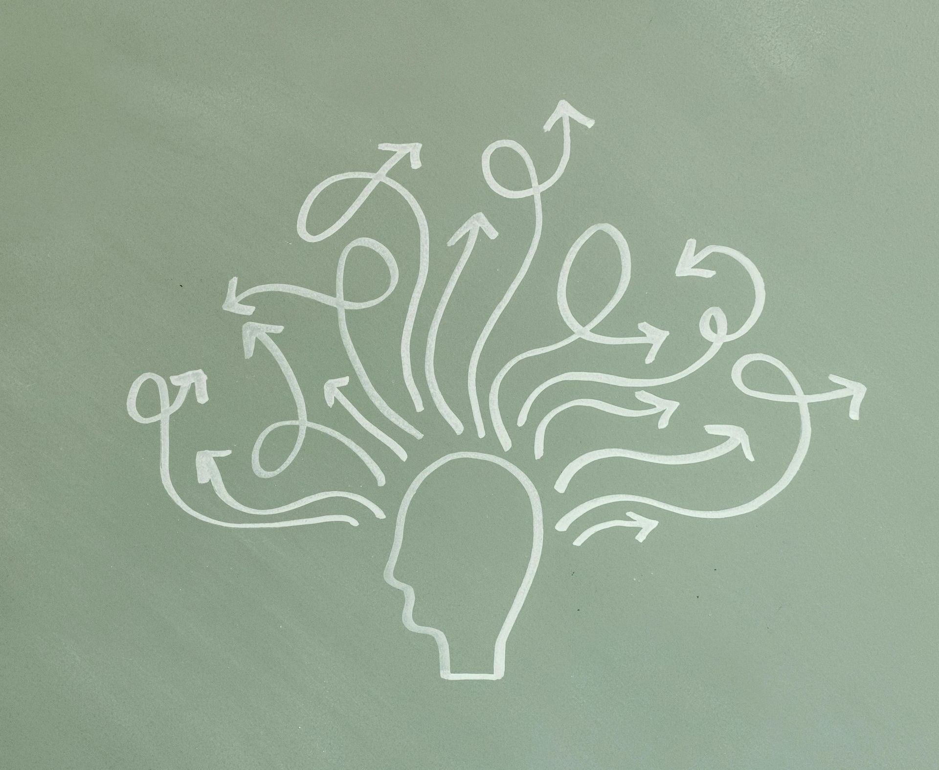 A drawing of a head with arrows coming out of it