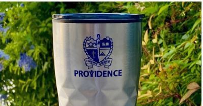A stainless steel tumbler with the word providence on it