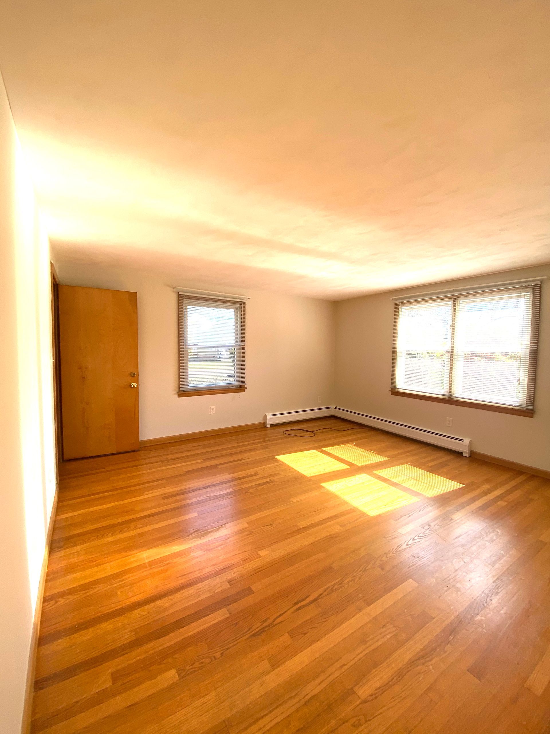 Room with wooden flooring — Vernon, CT — A1 Properties