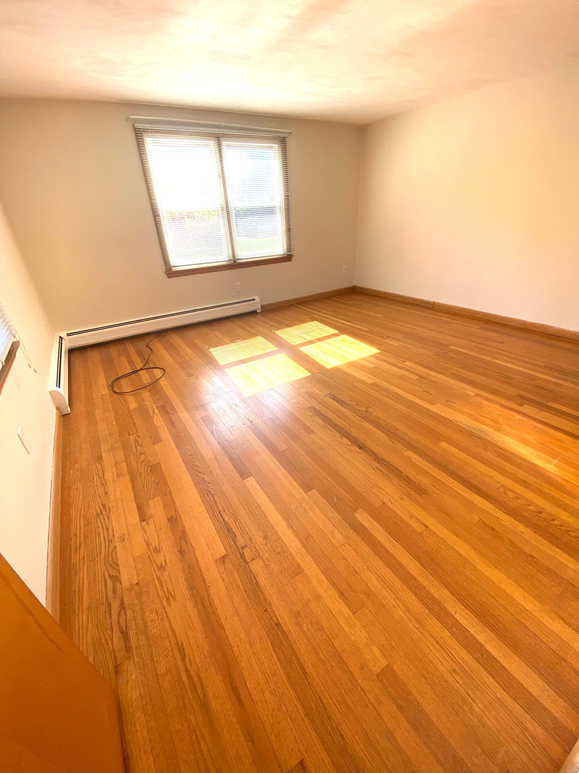 Wooden style spacious room — Vernon, CT — A1 Properties