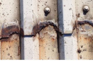 Cladding cut-edge corrosion prevention
