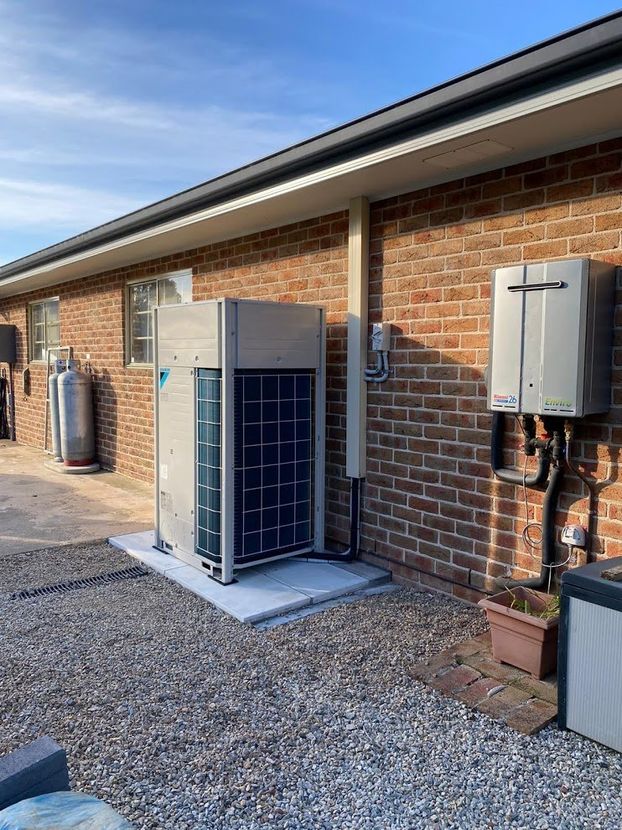 Condenser Unit Of Heating Ventilation System — Servicing Homes & Businesses in Albion Park, NSW