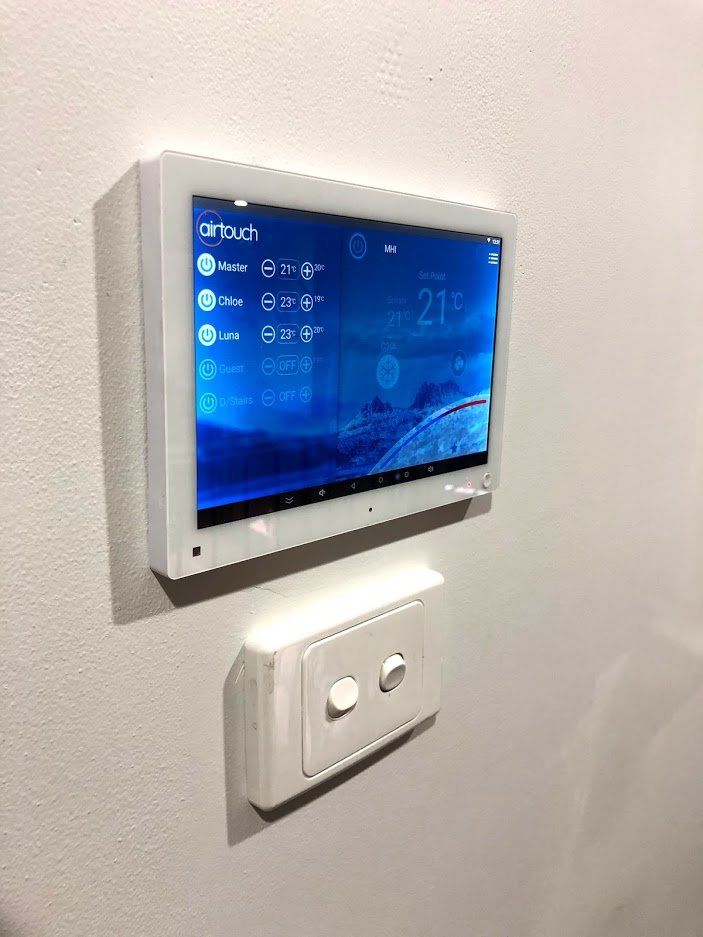 Air Touch Monitor System With Blue Background Colour — Servicing Homes & Businesses in Albion Park, NSW