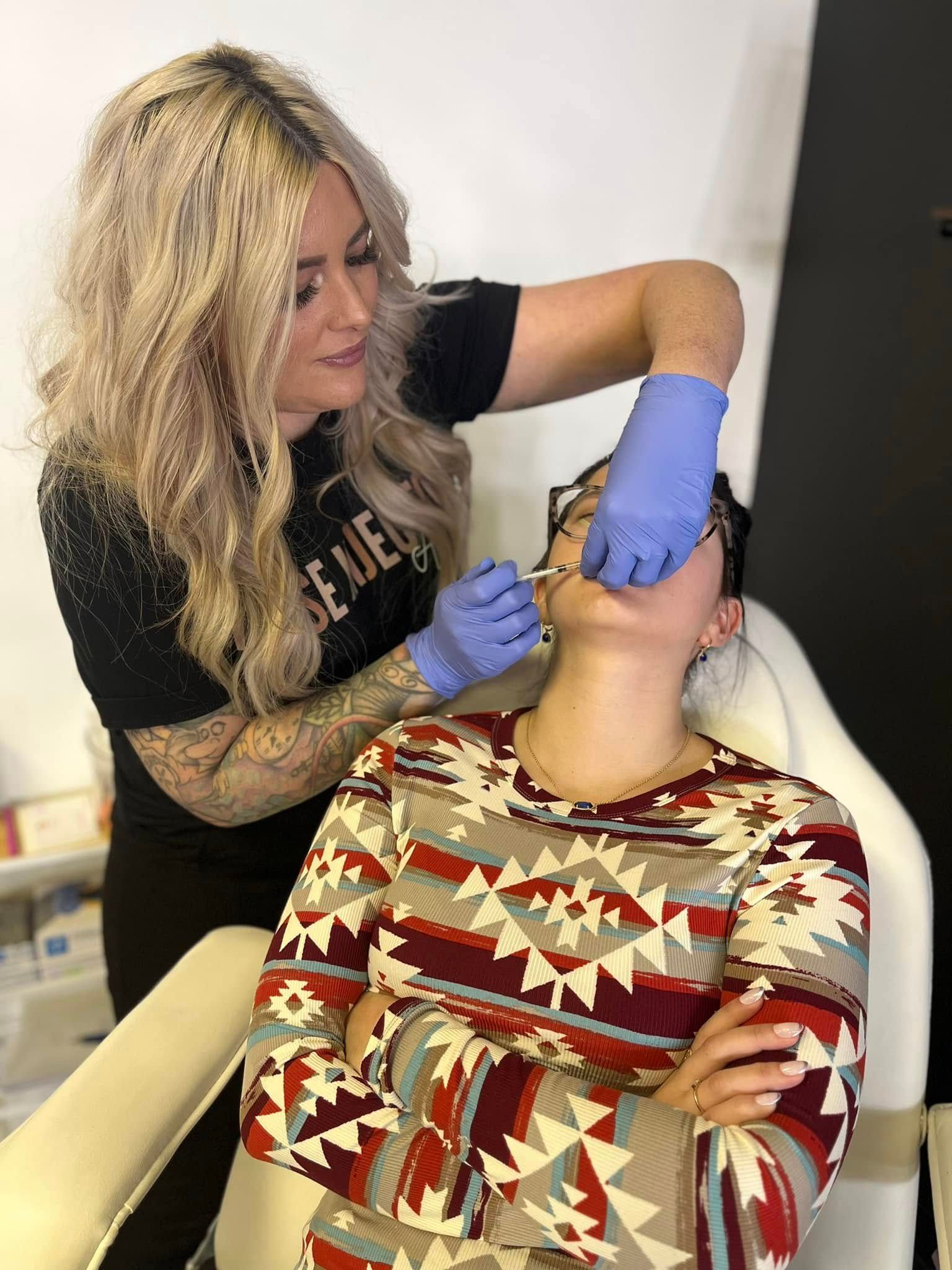 amanda giving lip filler treatments in springfield mo