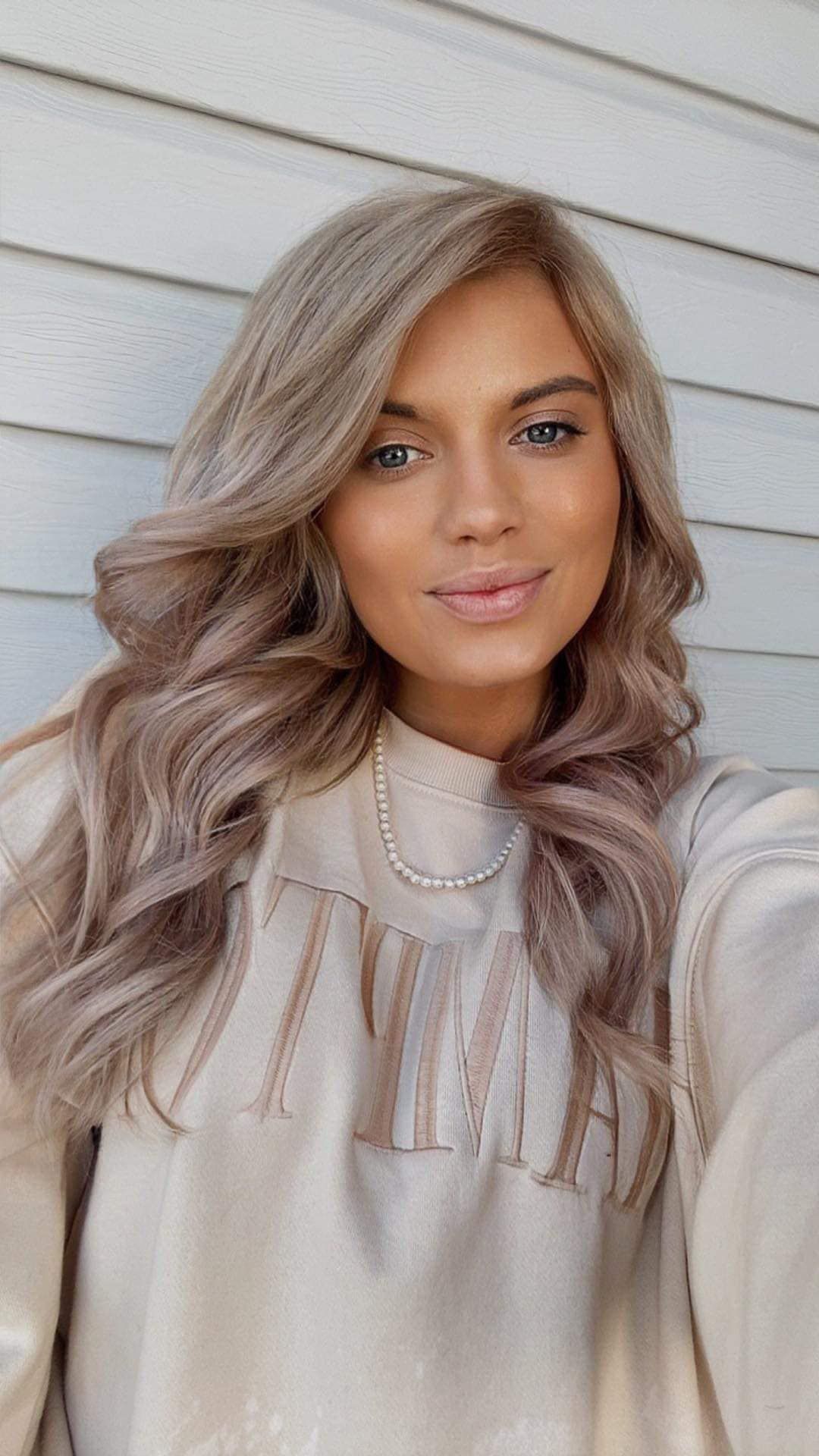 woman after blonding treatment in springfield mo