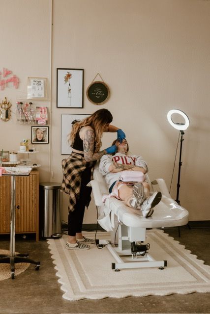 amanda giving botox and filler injections to client in springfield mo