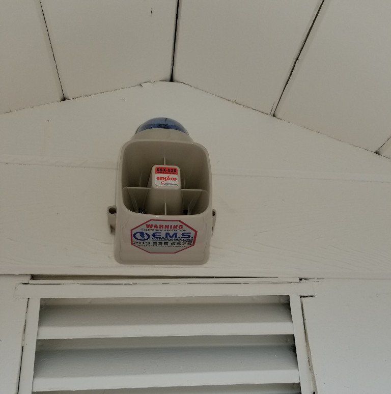 A speaker with the EMS Logo on it