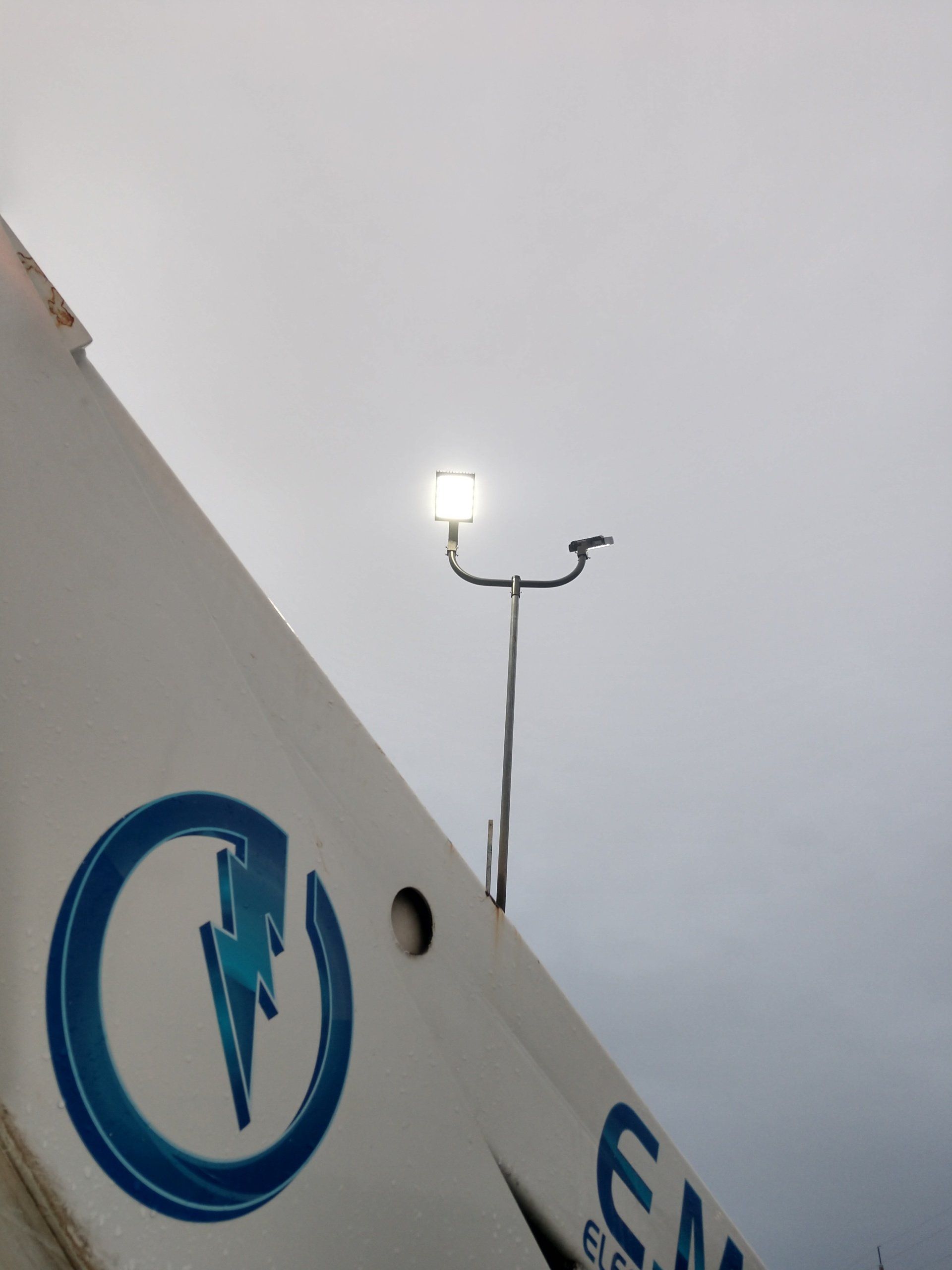 A lightning bolt is painted on the side of a building